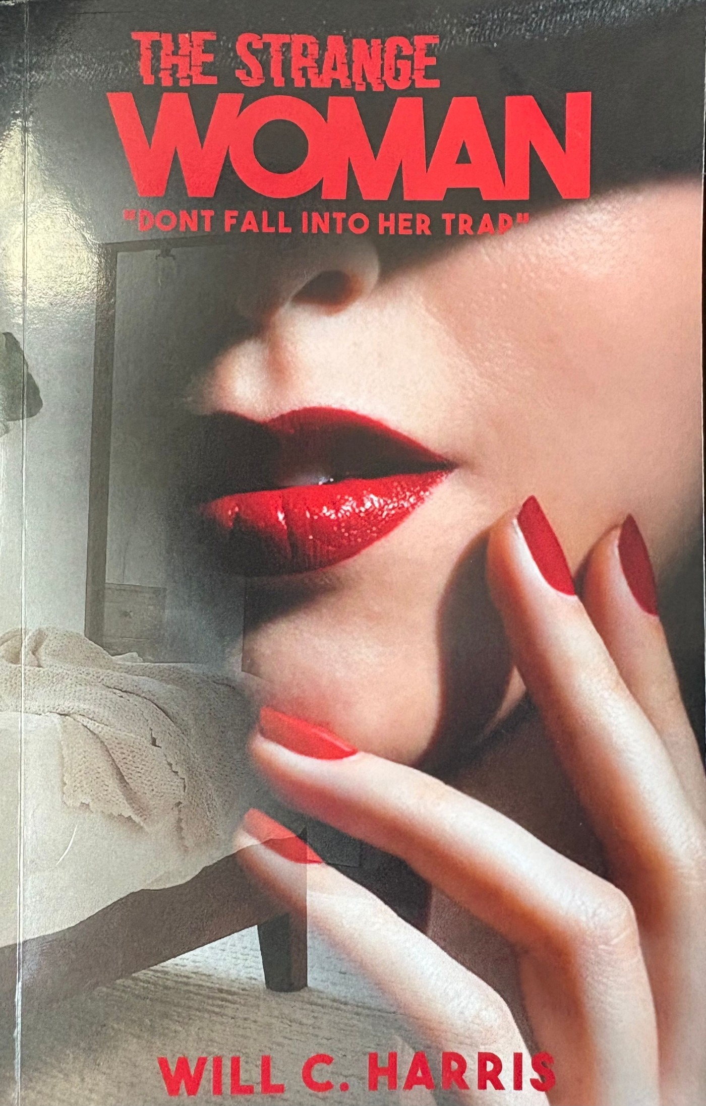 The Strange Woman book cover: Don't Fall Into Her Trap by Will C. Harris